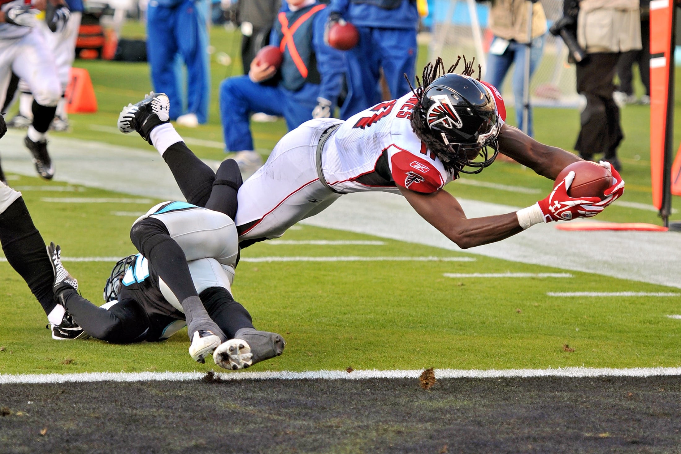 Football player diving for the end zone